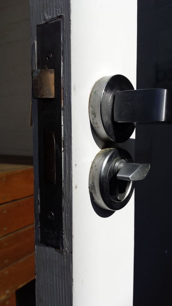 Installation of a modern deadlock for a door in Adelaide Clark Locksmiths