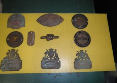 Historic emblems from second-hand safes restored by Clark Locksmiths